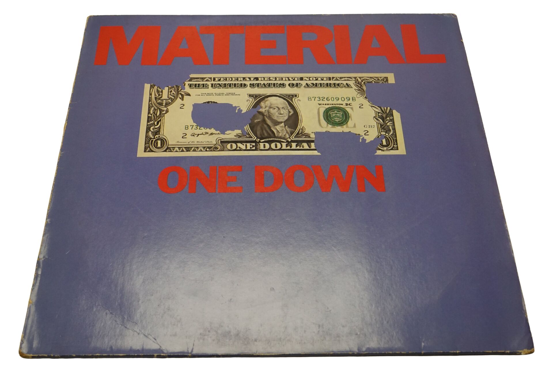 Material One Down - Plak